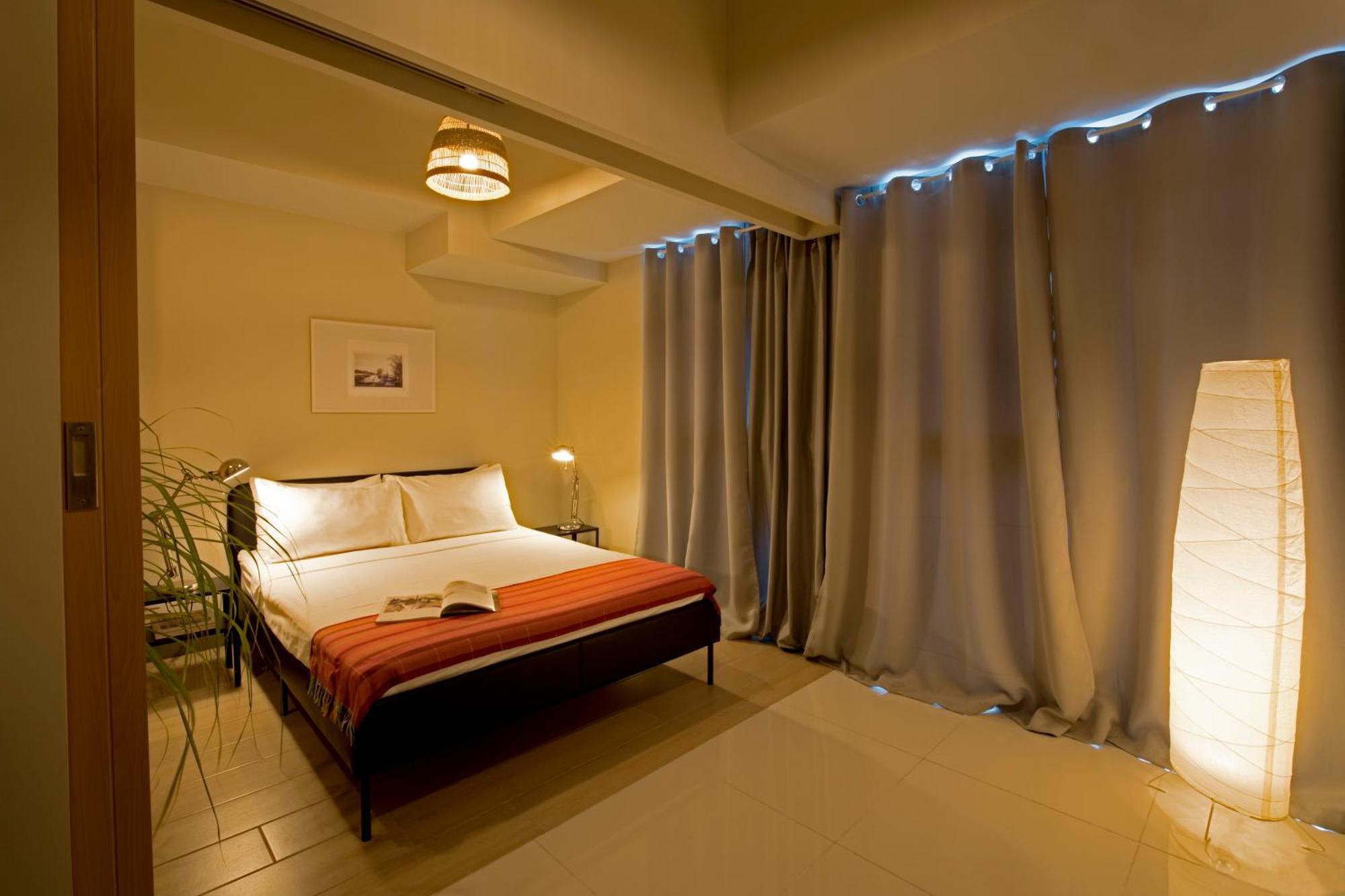 Uptown Parksuites Apartments Tower 2 Bgc By Ph Staycation Манила Экстерьер фото